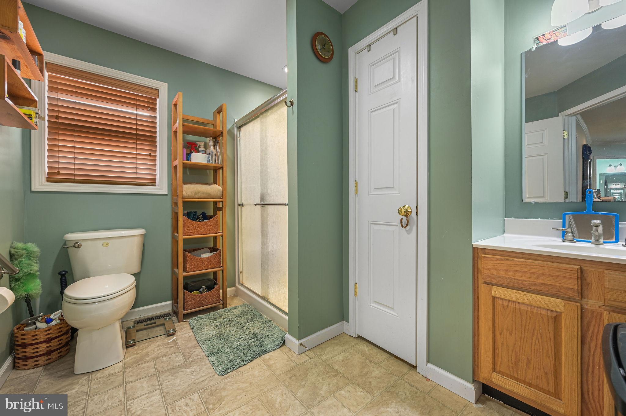 850 Arthursville Road Hartly, DE 19953 - Photo 29 of 35 a bathroom with a toilet sink and a shower
