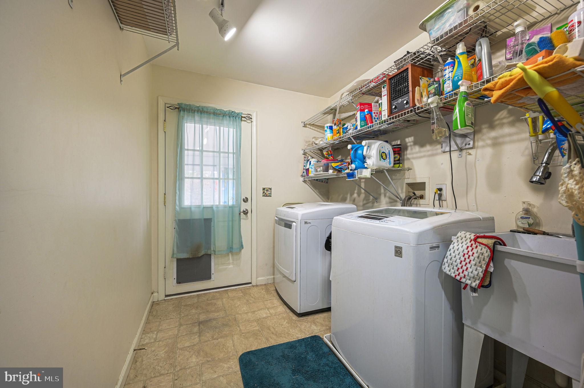 850 Arthursville Road Hartly, DE 19953 - Photo 31 of 35 a utility room with dryer and washer