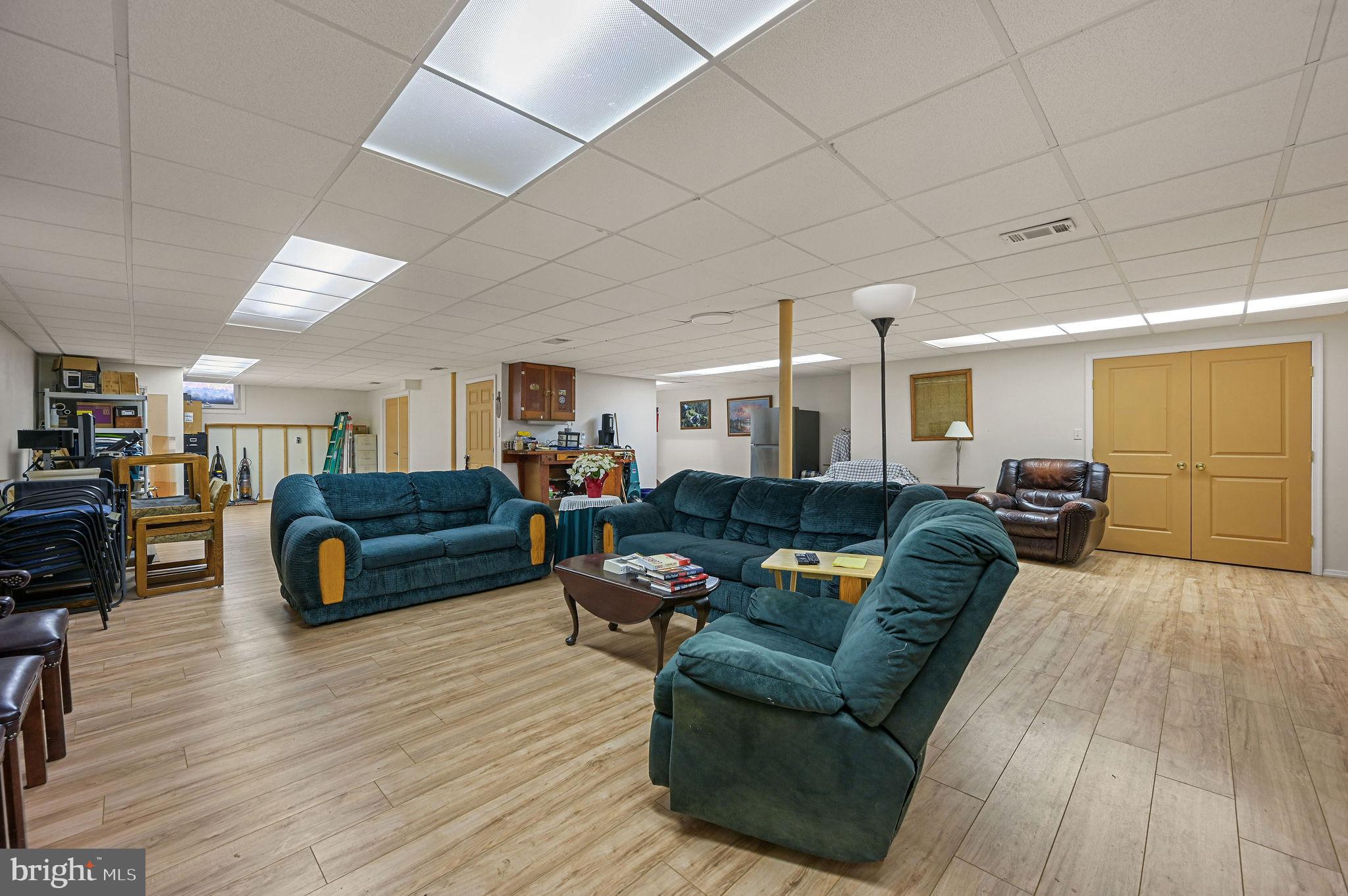 850 Arthursville Road Hartly, DE 19953 - Photo 35 of 35 a living room with furniture and wooden floor