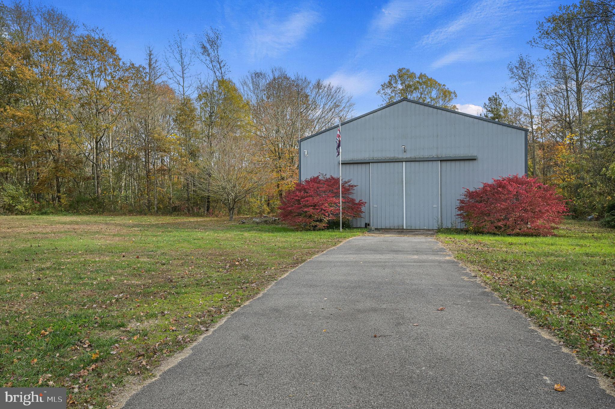 850 Arthursville Road Hartly, DE 19953 - Photo 6 of 35 a front view of a house with garden