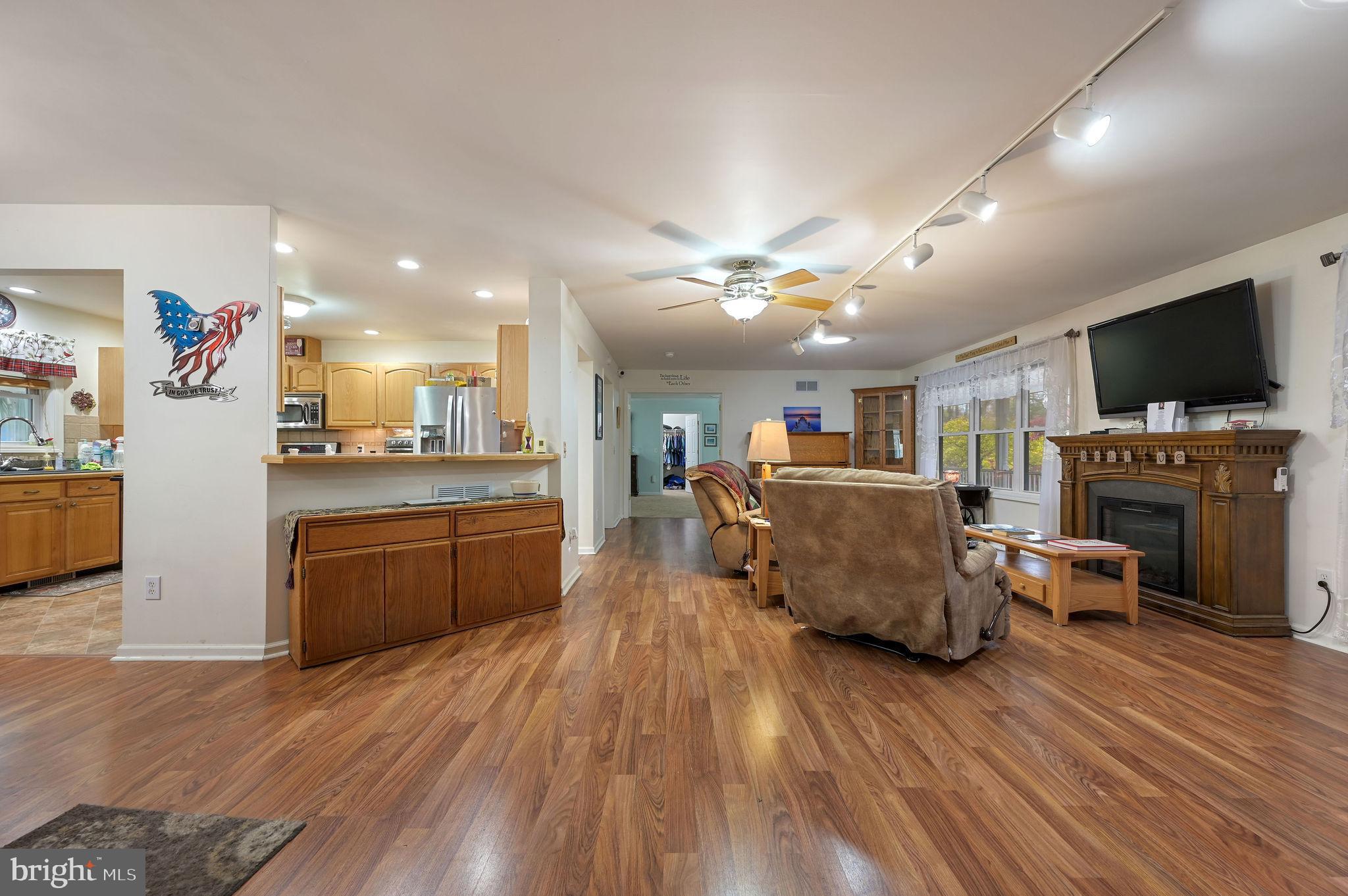 850 Arthursville Road Hartly, DE 19953 - Photo 7 of 35 a living room with furniture and a flat screen tv