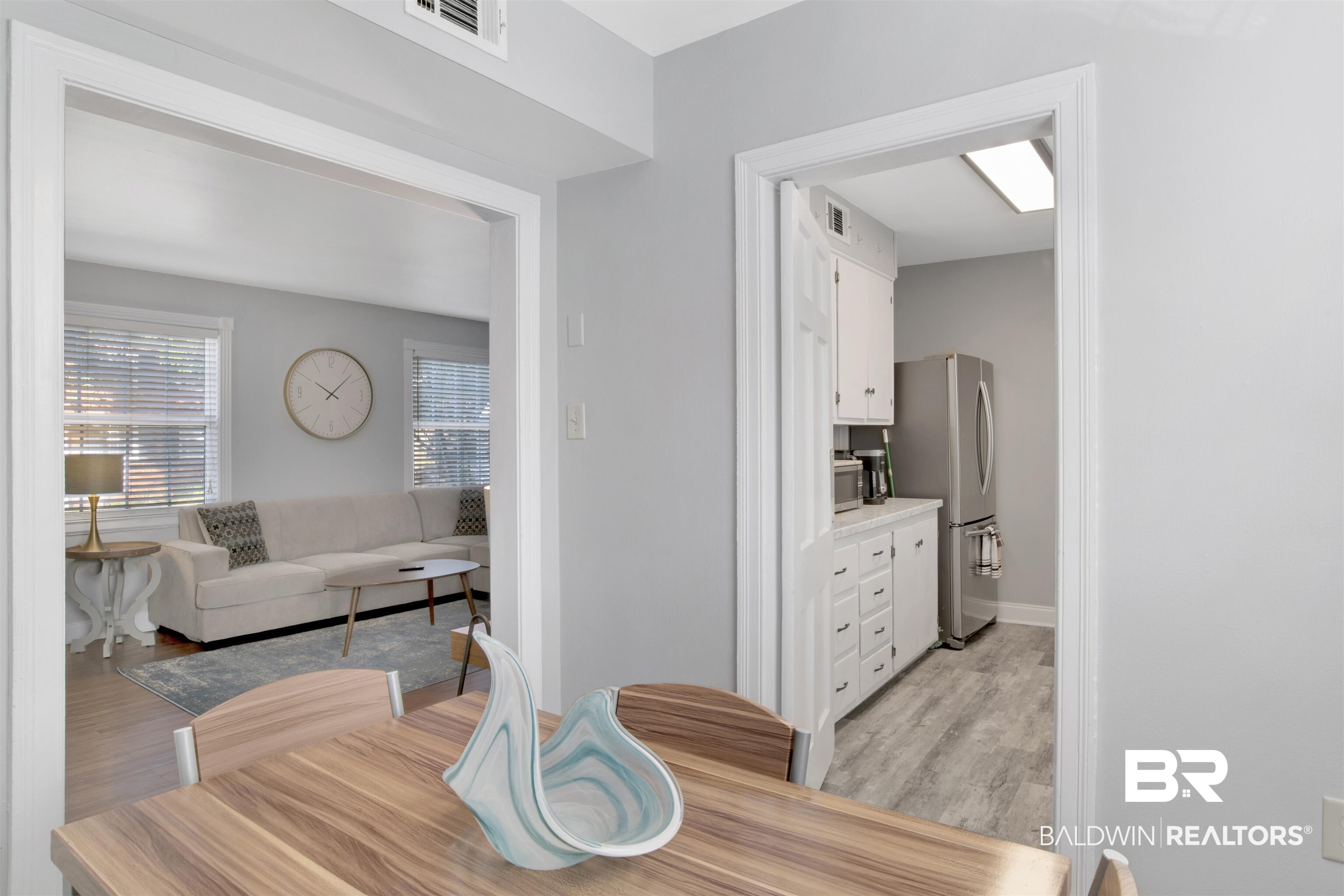 214 Upham Street, Unit 7A Mobile, AL 36607 - Photo 3 of 35 Dining area featuring light wood-style flooring and baseboards