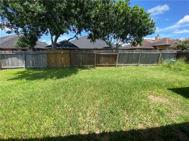 a view of a backyard with a garden