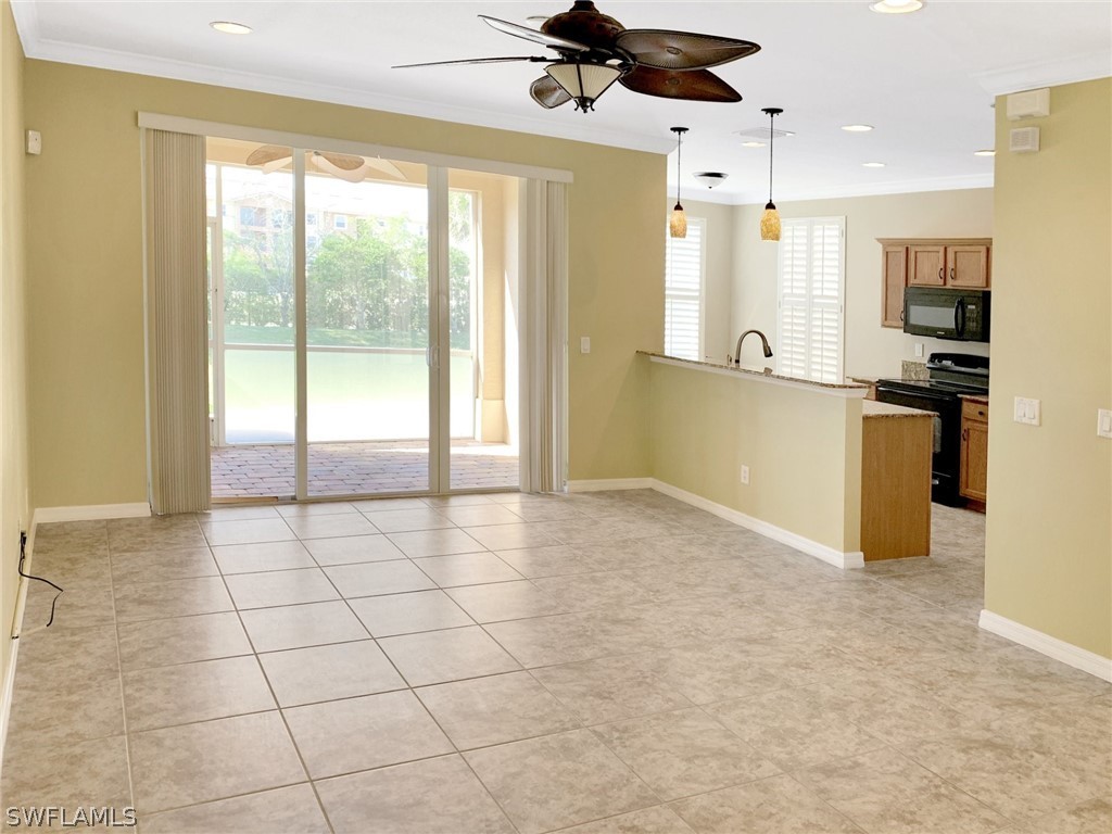 4100 Cherrybrook Loop Fort Myers, FL 33966 - Photo 6 of 25 a view of a kitchen with a stove