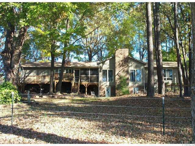Back of home which overlooks the pond.