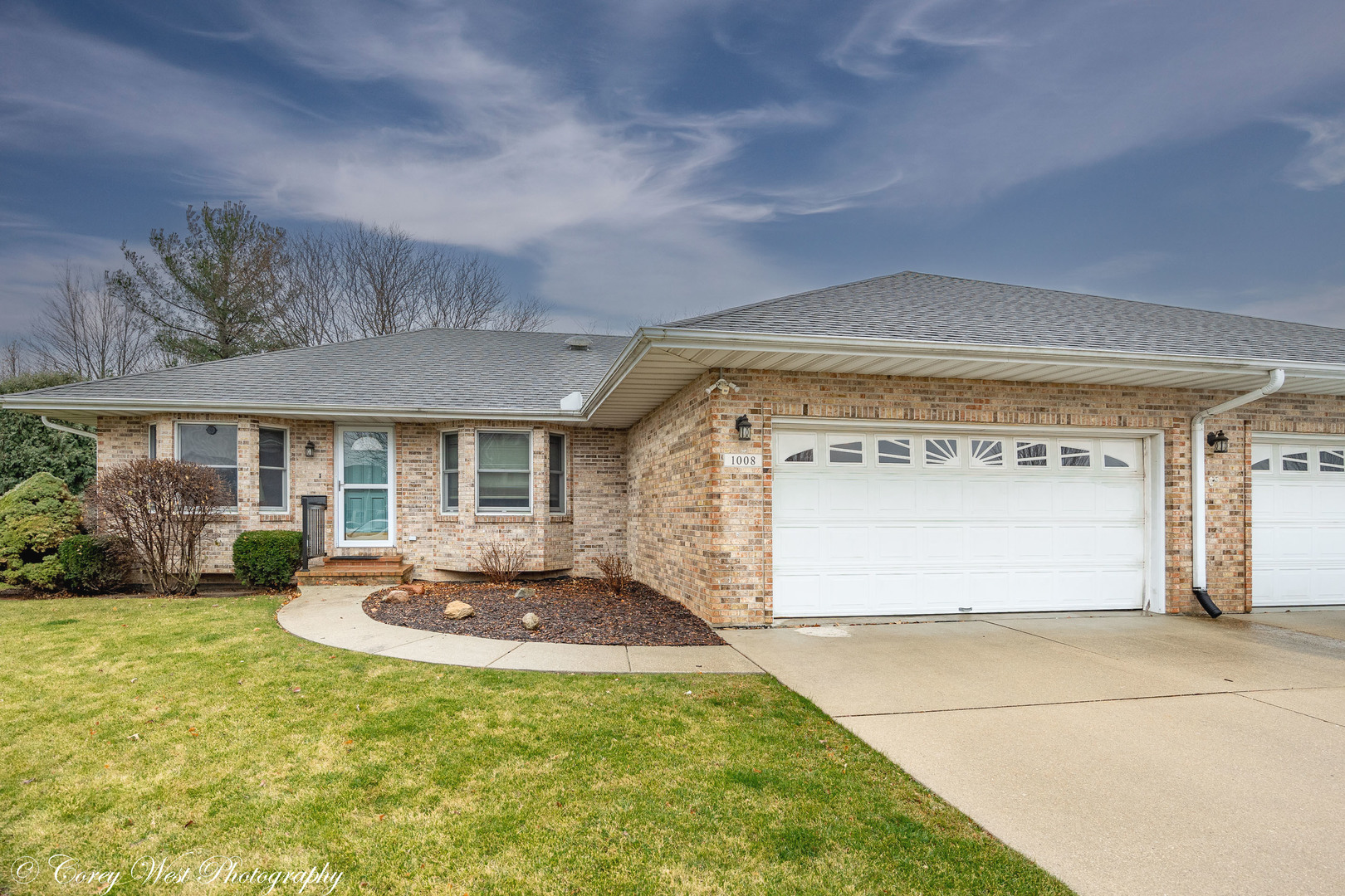 1008 Sunset Terrace Rochelle, IL 61068 - Photo 1 of 30 a front view of a house with garden