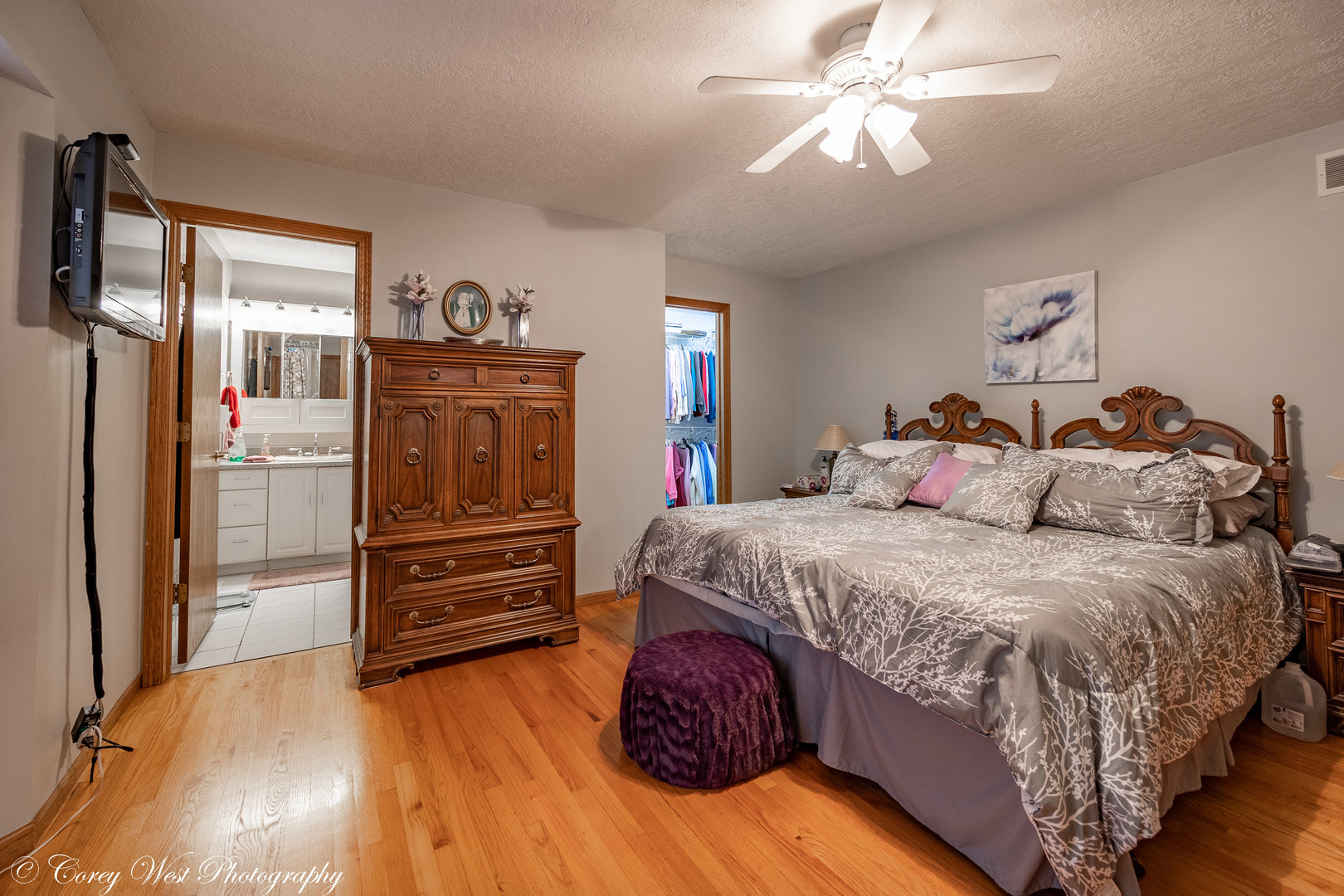 1008 Sunset Terrace Rochelle, IL 61068 - Photo 15 of 30 a bedroom with a bed and wooden floor