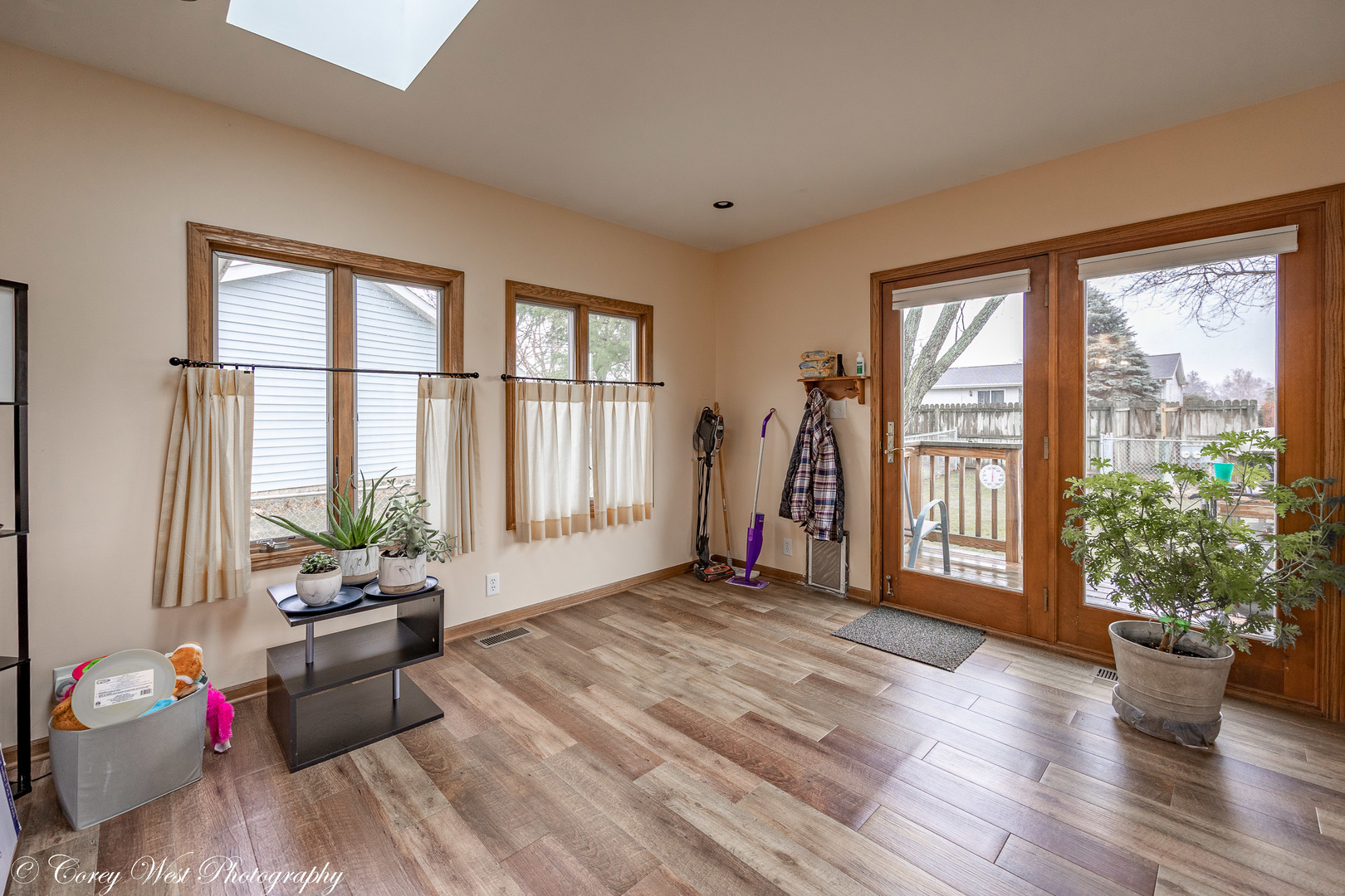 1008 Sunset Terrace Rochelle, IL 61068 - Photo 9 of 30 a living room with furniture and floor to ceiling windows
