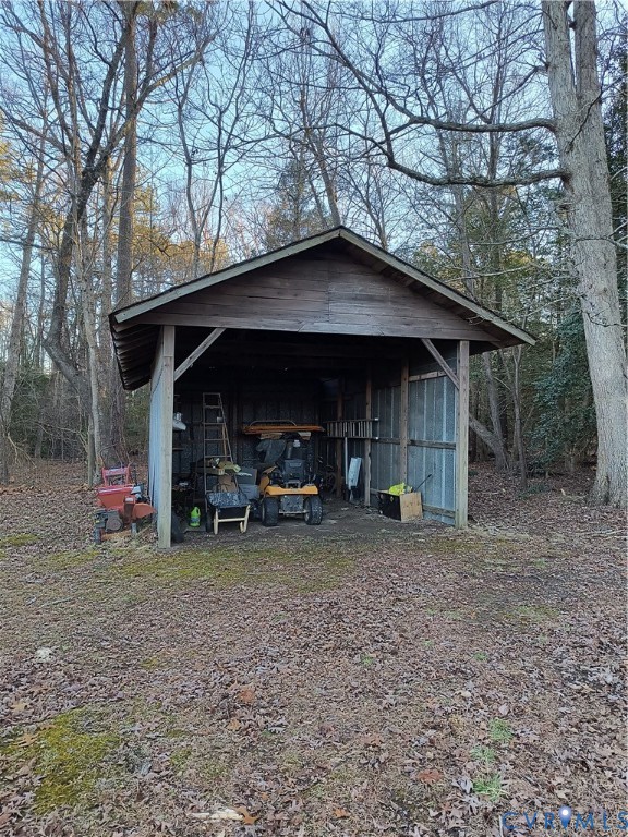 9913 Graves Road Petersburg, VA 23803 - Photo 16 of 24 a view of a house with a yard and sitting area