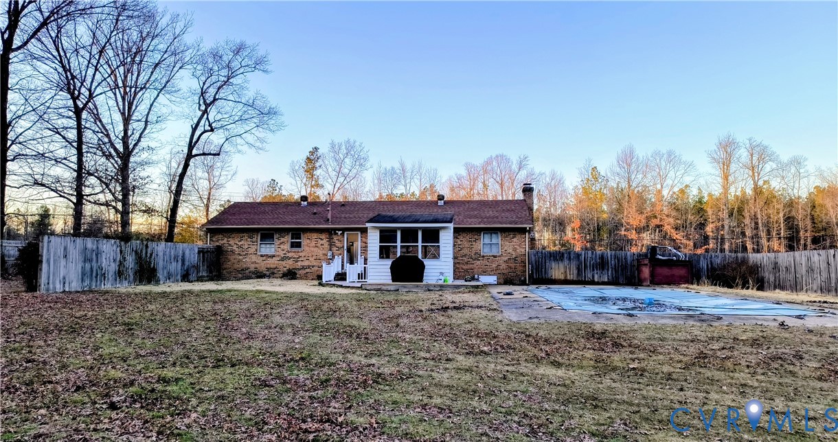 9913 Graves Road Petersburg, VA 23803 - Photo 20 of 24 a view of a house with a yard