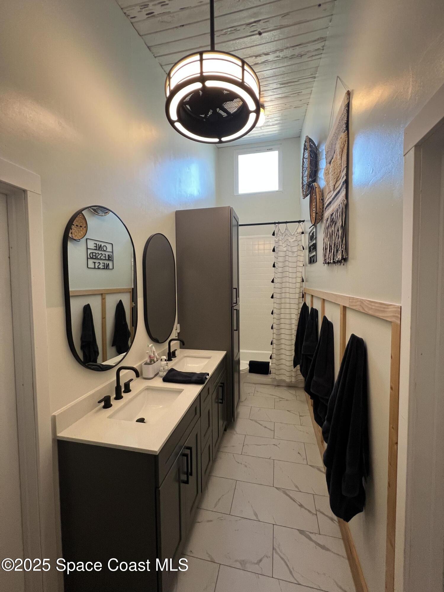 240 Provincial Drive Melbourne, FL 32903 - Photo 14 of 26 Upstairs Bathroom