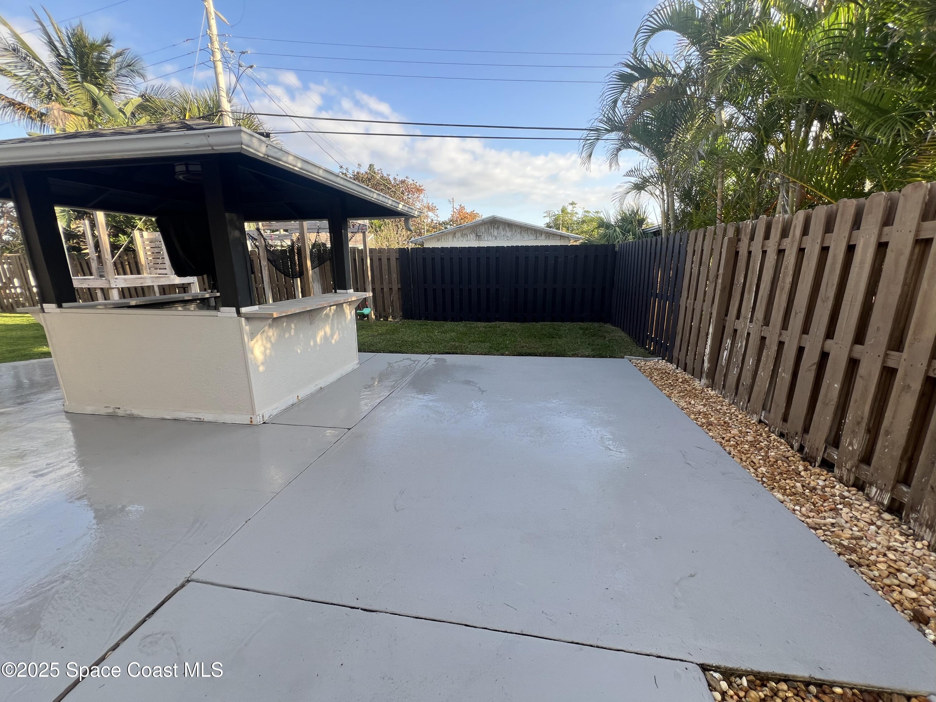 240 Provincial Drive Melbourne, FL 32903 - Photo 19 of 26 Backyard Entertaining