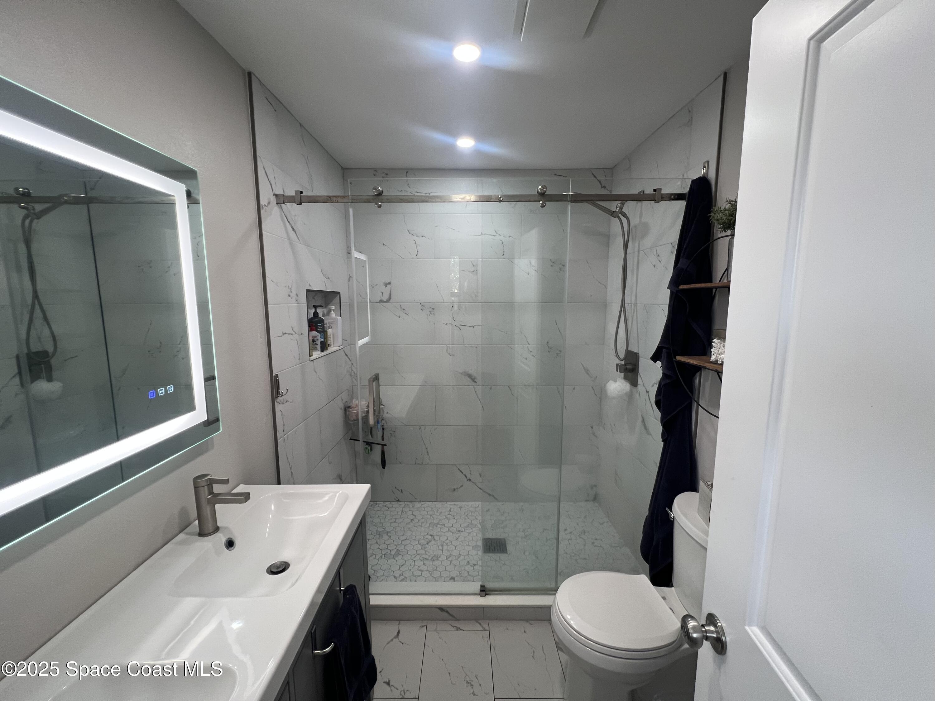 240 Provincial Drive Melbourne, FL 32903 - Photo 9 of 26 Downstairs Bathroom