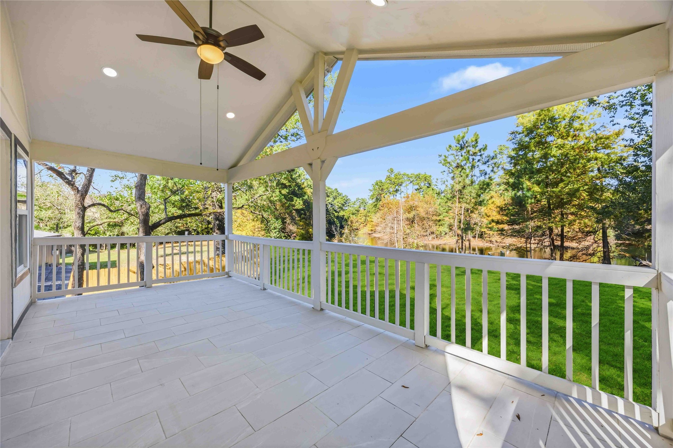 18234 Atkinson Lane Conroe, TX 77384 - Photo 21 of 30 a view of a porch and garden