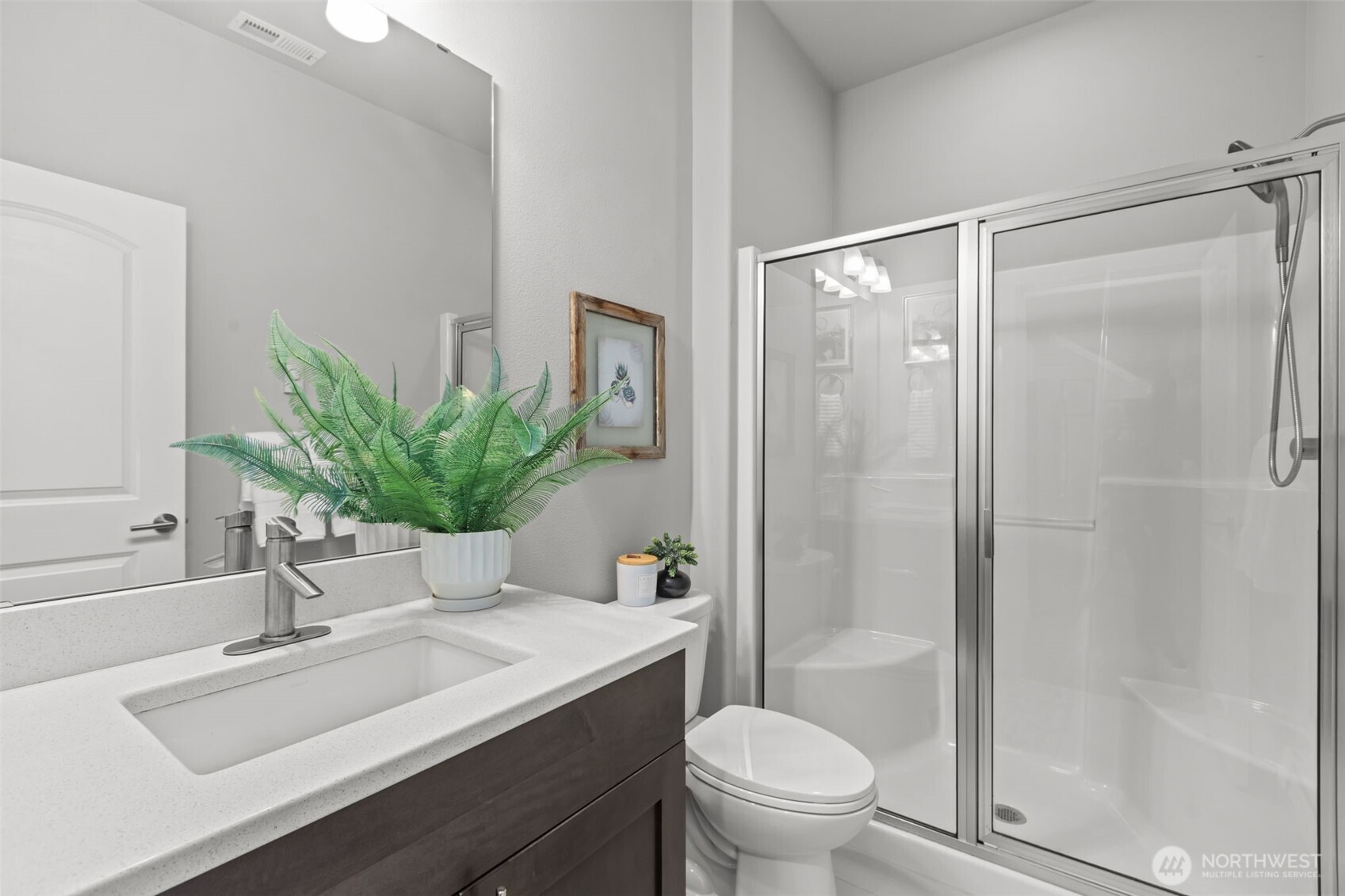 18231 3rd Drive Southeast Bothell, WA 98012 - Photo 30 of 40 a bathroom with a sink a toilet and shower