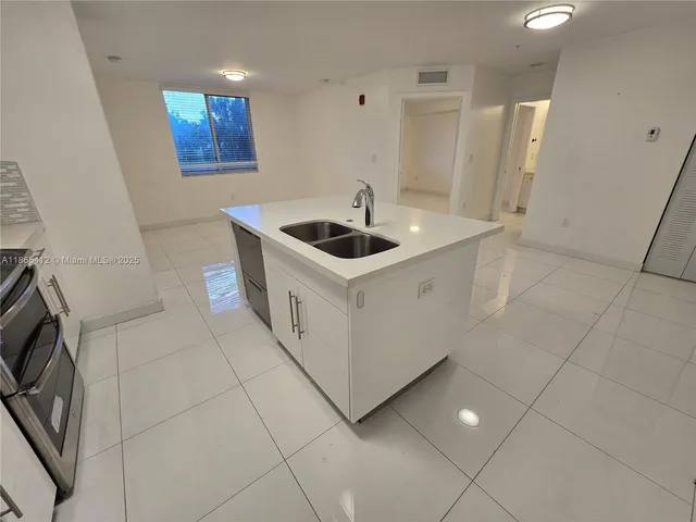 a utility room with washer and dryer