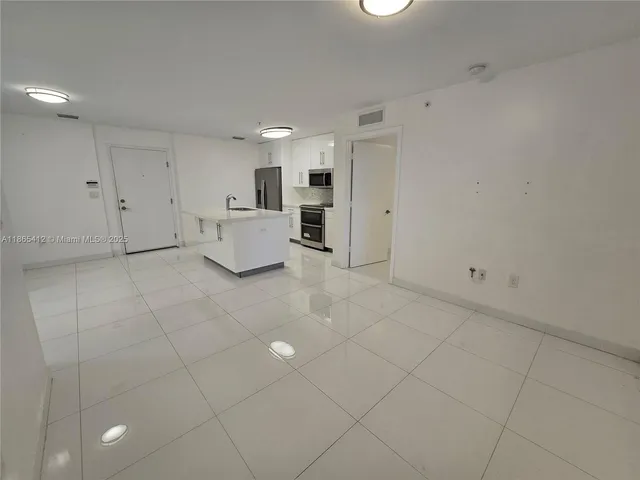 a large white room with white walls