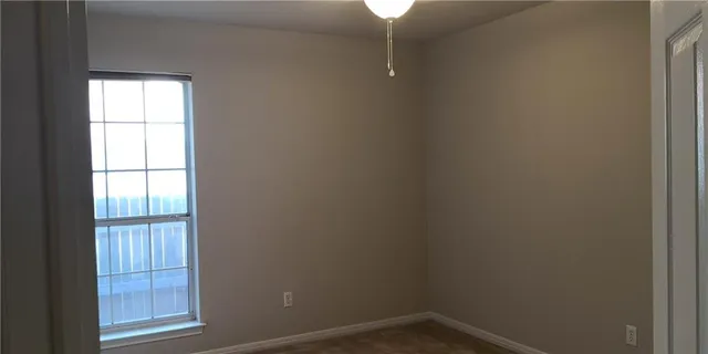 an empty room with windows