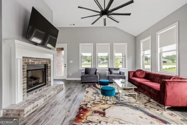 a living room with furniture or fireplace and a flat screen tv