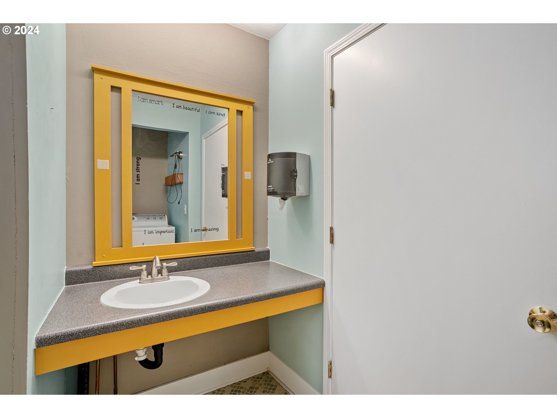 15525 Northeast Caples Road Brush Prairie, WA 98606 - Photo 15 of 40 a bathroom with a sink and a mirror