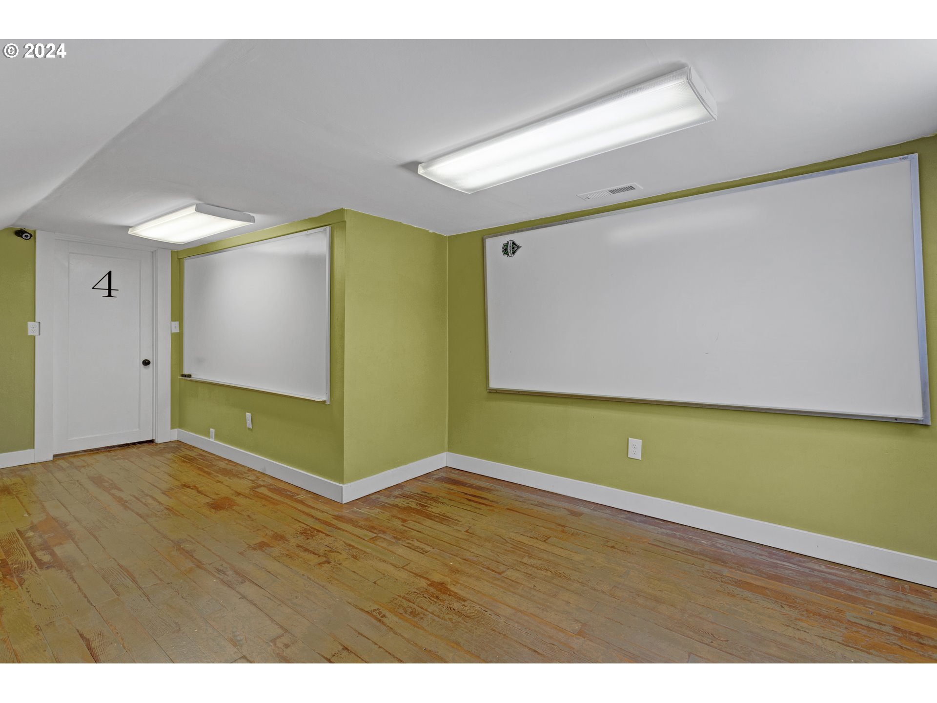 15525 Northeast Caples Road Brush Prairie, WA 98606 - Photo 23 of 40 a view of an empty room with wooden floor