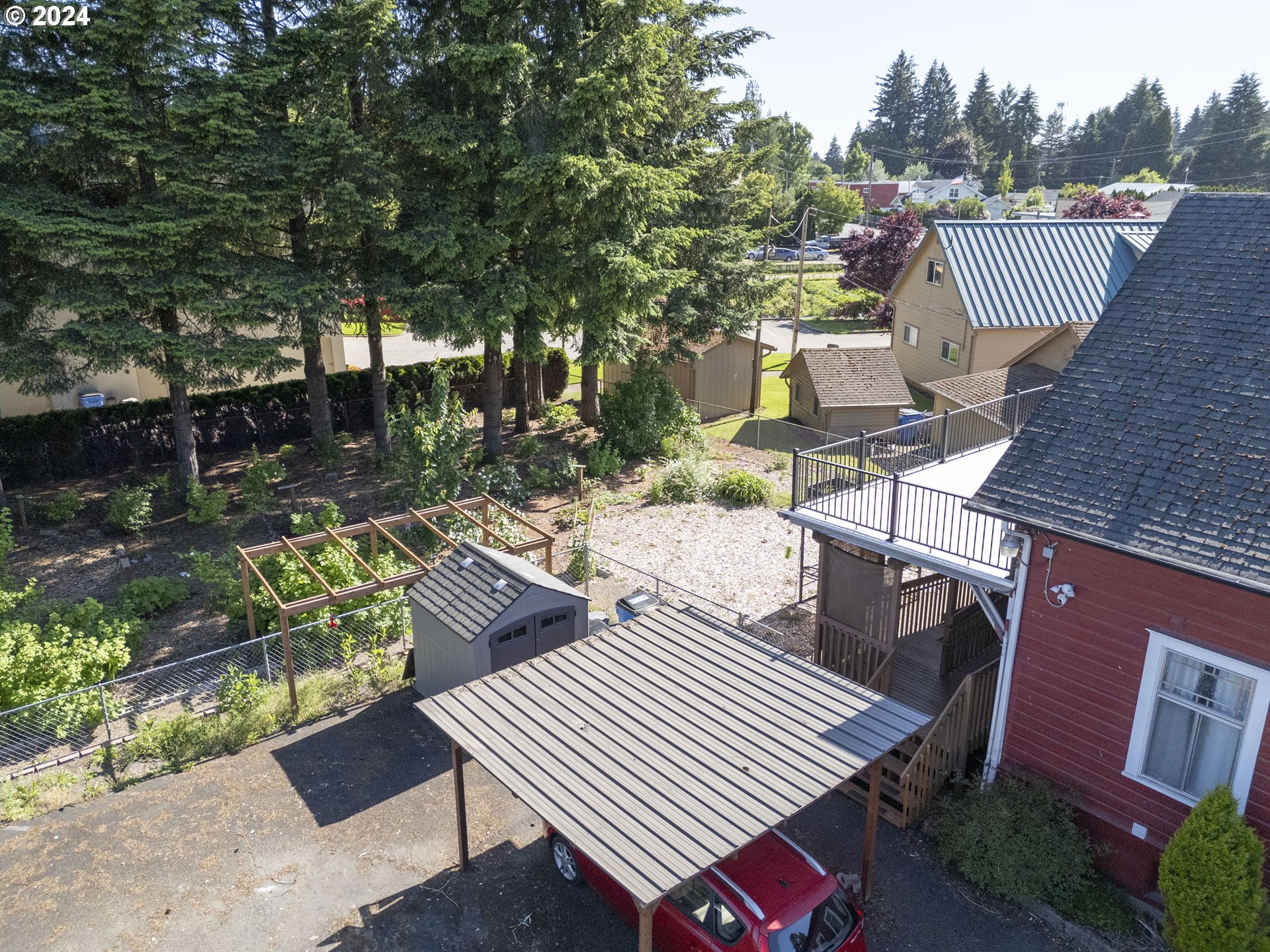 15525 Northeast Caples Road Brush Prairie, WA 98606 - Photo 5 of 40 a view of a patio with table and chairs and potted plants