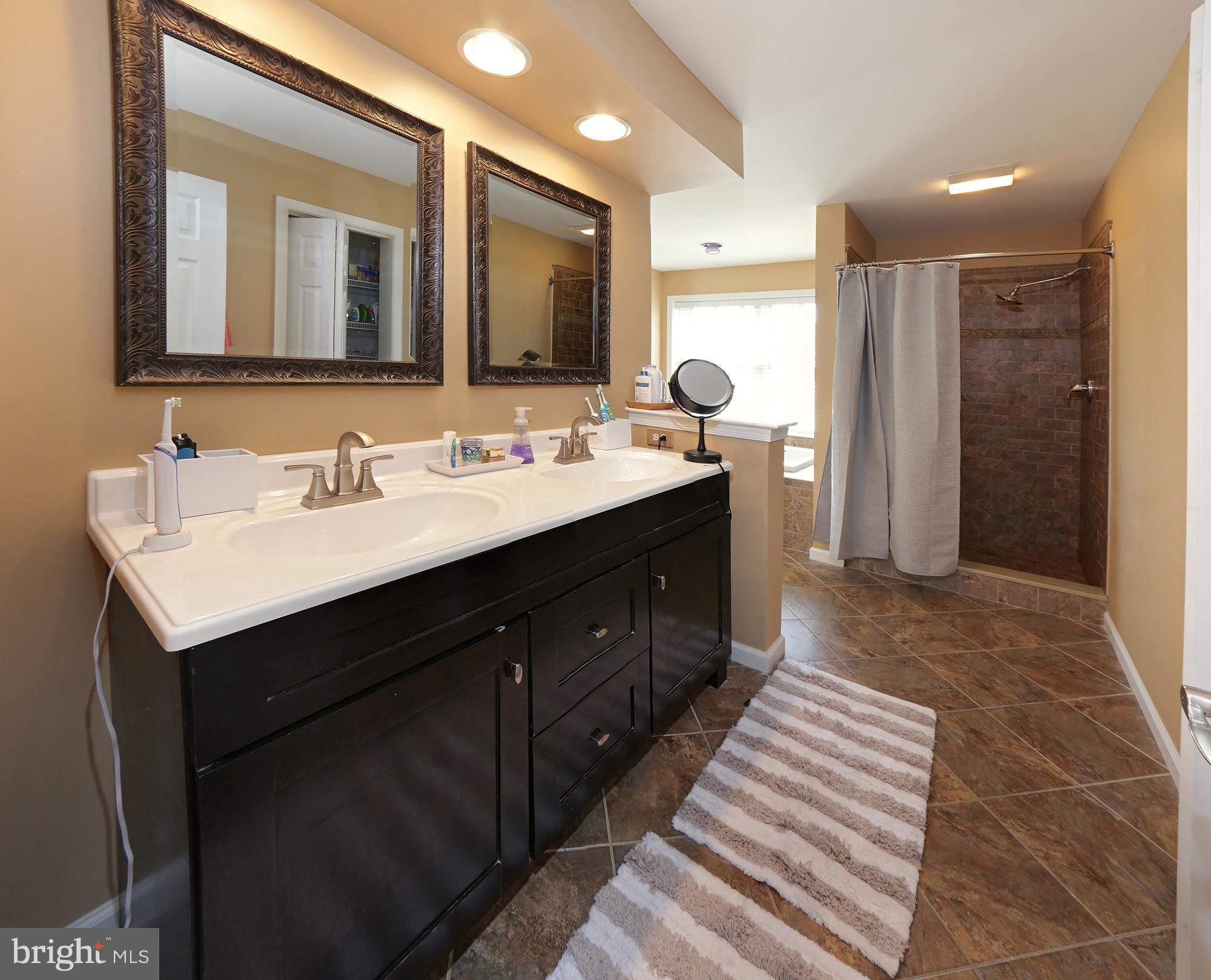309 Bloomfield Drive Lititz, PA 17543 - Photo 29 of 50 Master bath tiled stall shower and dual sinks