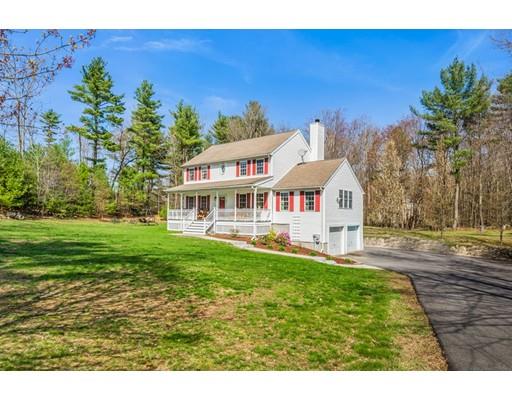 95 Haggerty Road Charlton, MA 01507 - Photo 1 of 30 a front view of a house with garden