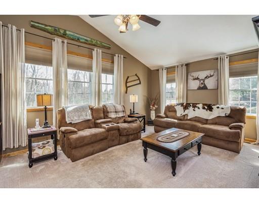 95 Haggerty Road Charlton, MA 01507 - Photo 15 of 30 a living room with furniture and a large window