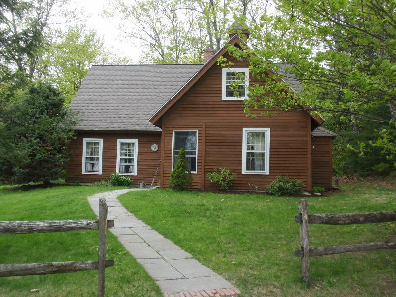 5 Smith Road Sandisfield, MA 01255 - Photo 2 of 38 a front view of a house with a yard