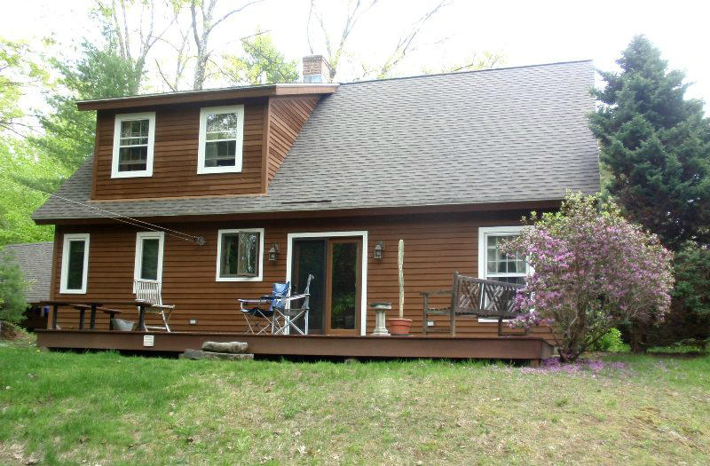 5 Smith Road Sandisfield, MA 01255 - Photo 36 of 38 a front view of a house with a garden