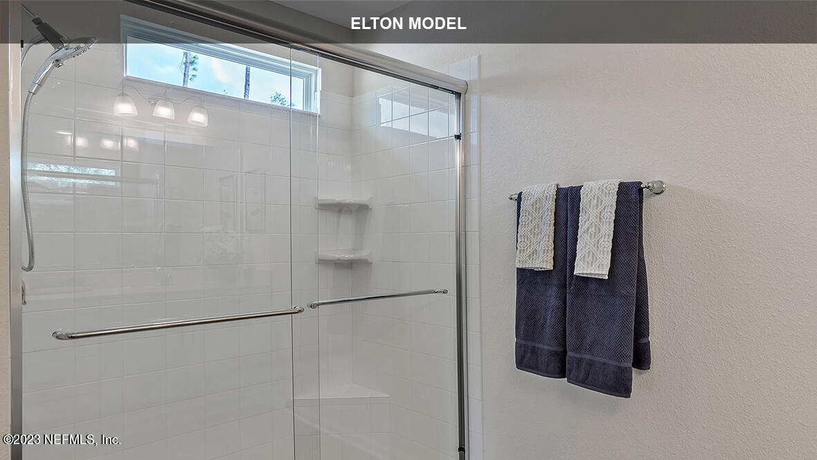 65 Zancara Street St. Augustine, FL 32084 - Photo 10 of 45 a bathroom with a shower