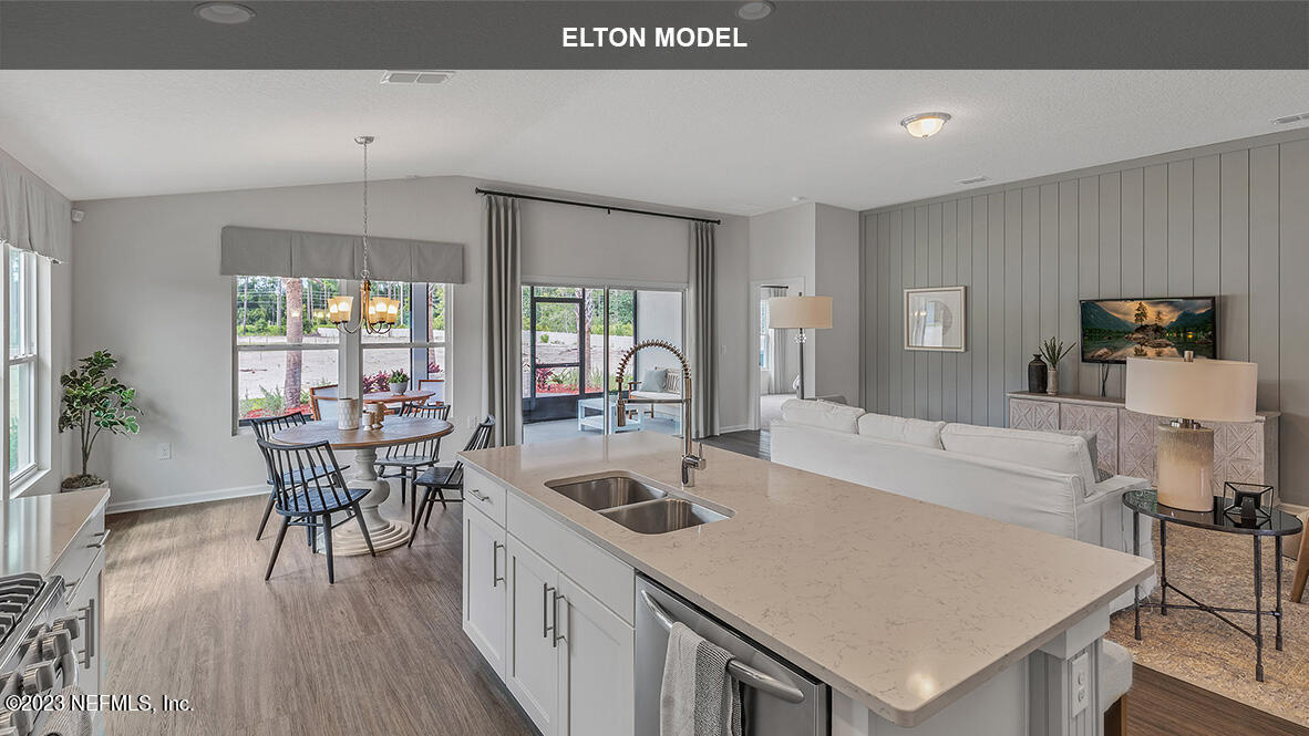 65 Zancara Street St. Augustine, FL 32084 - Photo 5 of 45 a view of a dining room with furniture and wooden floor