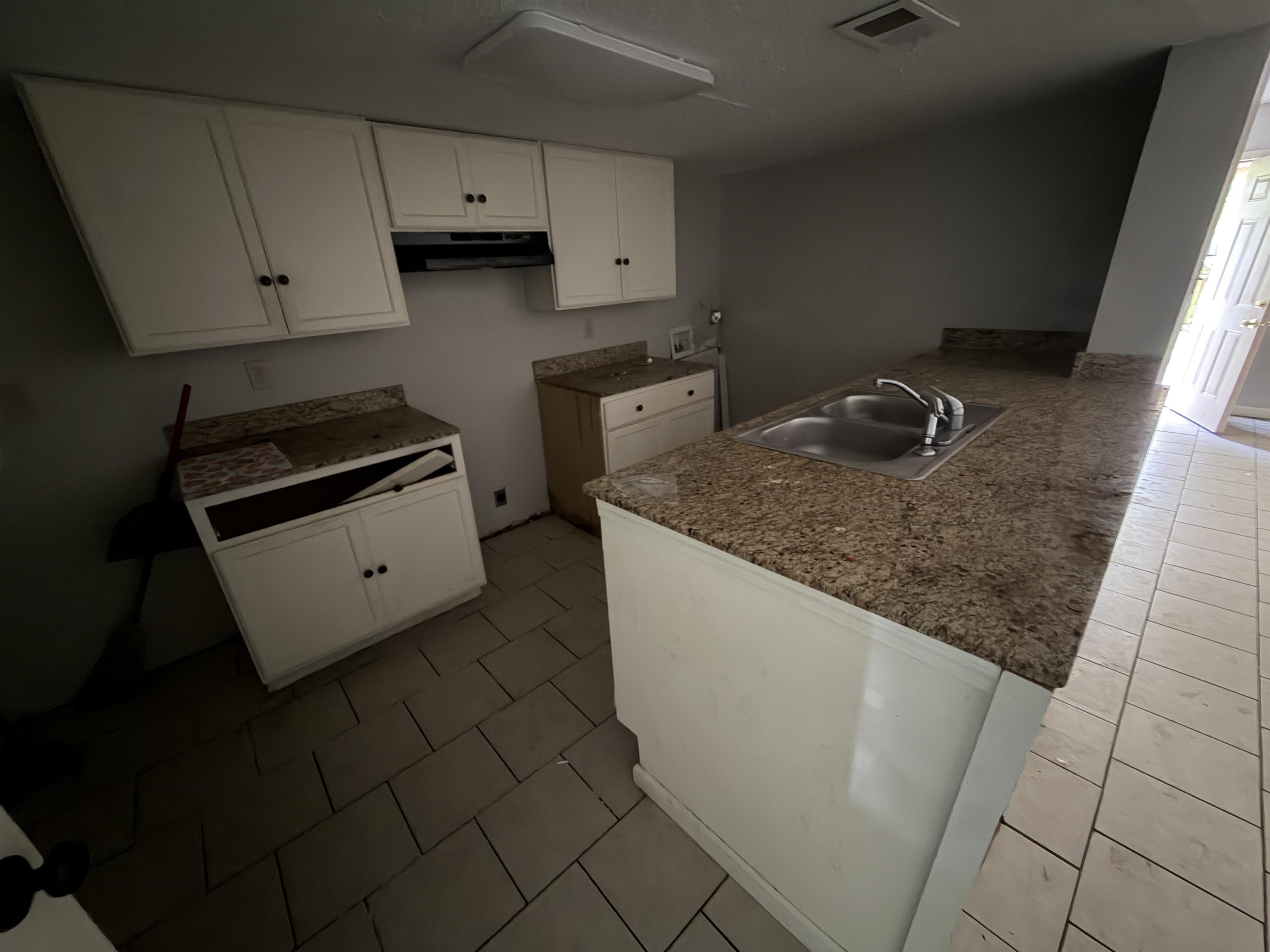5573 Pleasant View Road, Unit 35 Memphis, TN 38134 - Photo 6 of 13 a kitchen with stainless steel appliances granite countertop a sink stove and cabinets