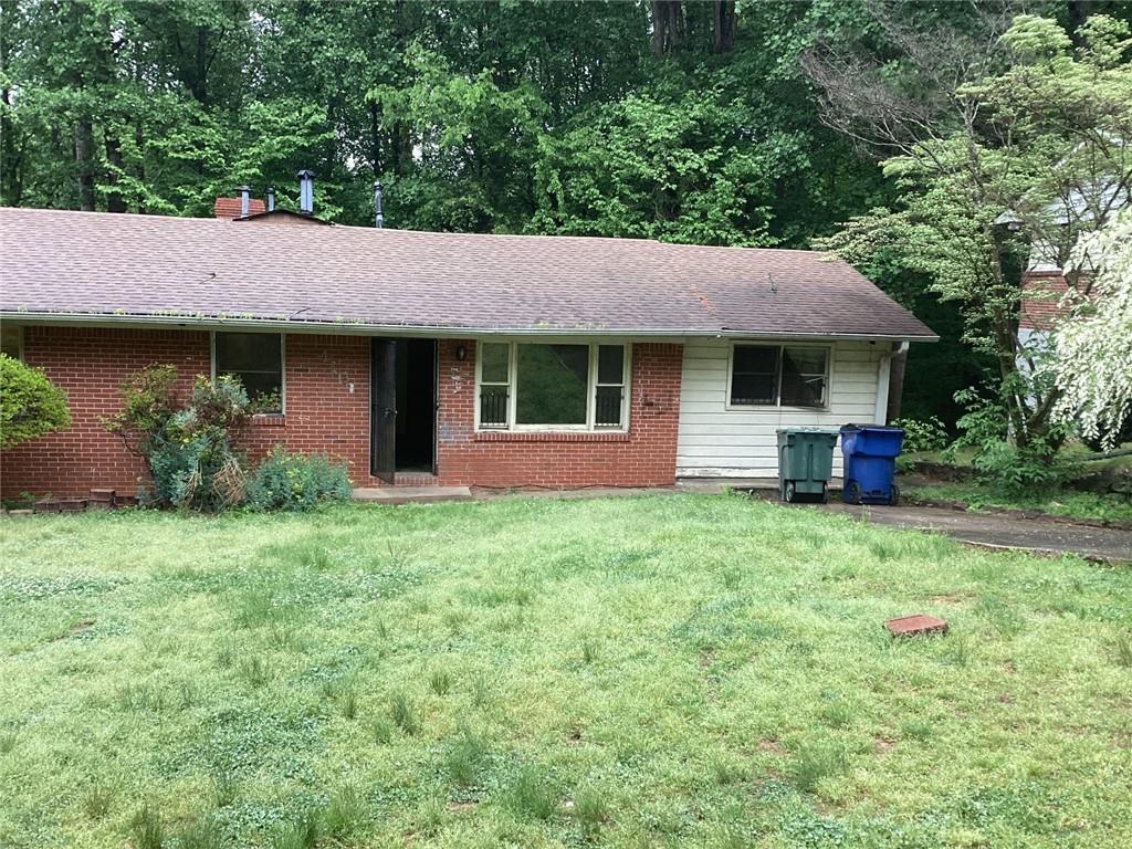 4151 Cornell Boulevard Southwest Atlanta, GA 30331 - Photo 1 of 1 a backyard of a house with seating space