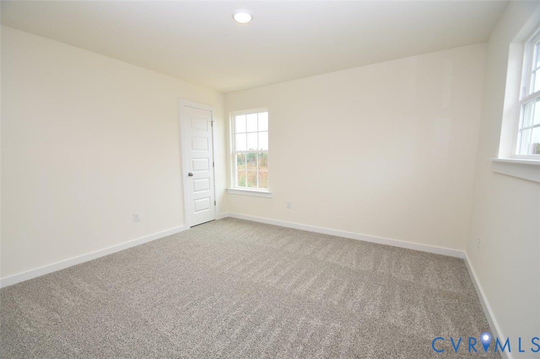2633 Butterbean Court Henrico, VA 23231 - Photo 14 of 18 an empty room with windows