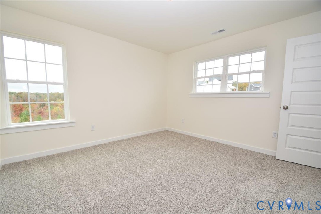 2633 Butterbean Court Henrico, VA 23231 - Photo 7 of 18 an empty room with windows