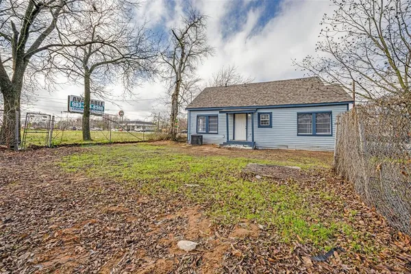 a house view with a garden space