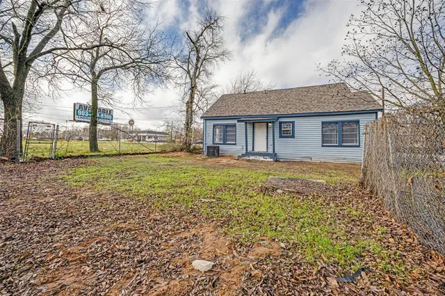 a house view with a garden space