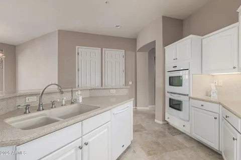 a view of a black and white wall next to a window