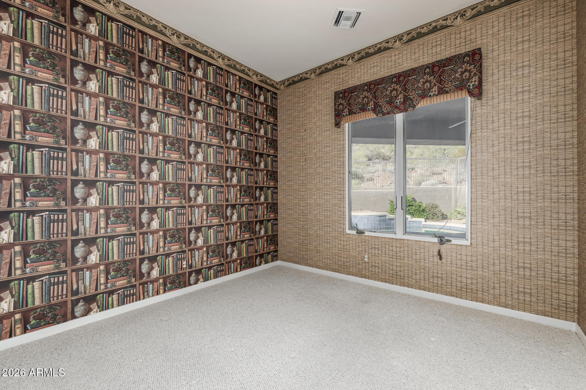 14146 East Coyote Road Scottsdale, AZ 85259 - Photo 13 of 40 a view of a black and white wall next to a window