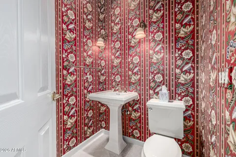 a view of room with window and a ceiling fan