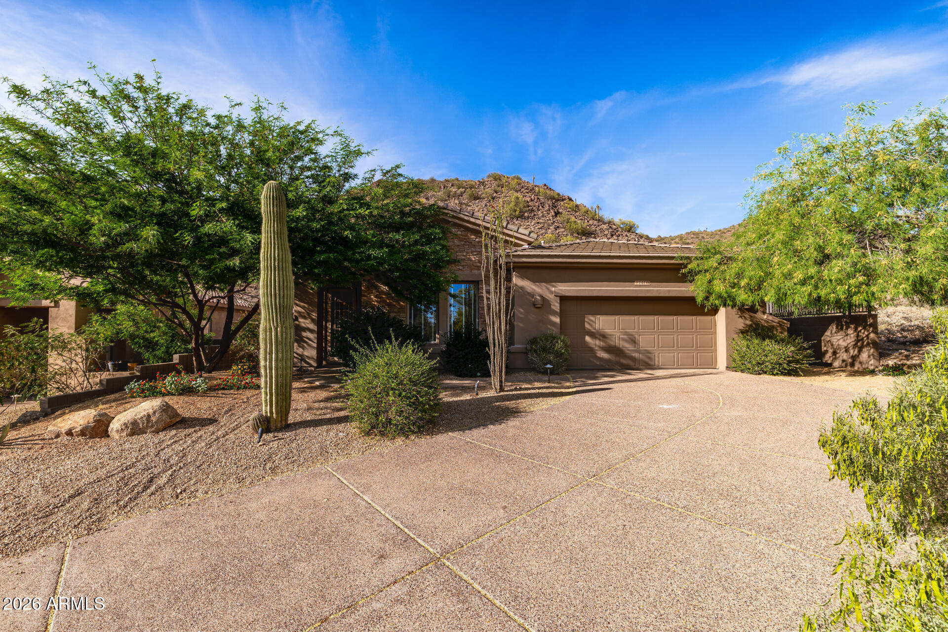 14146 East Coyote Road Scottsdale, AZ 85259 - Photo 2 of 40 front view of a house with a street