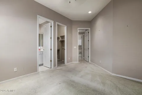 a bathroom with a sink toilet vanity tub and shower