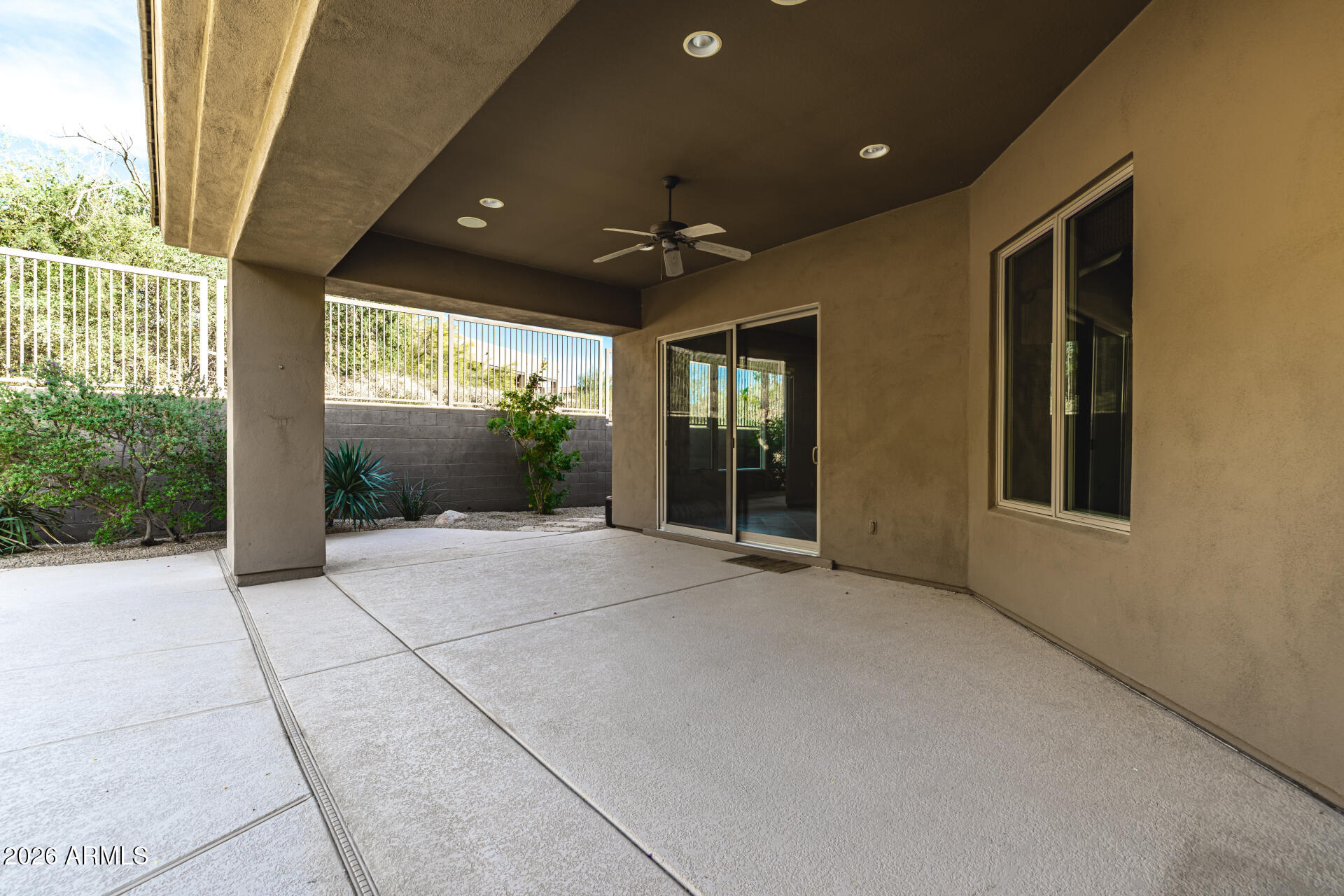 14146 East Coyote Road Scottsdale, AZ 85259 - Photo 26 of 40 a view of an entryway with a floor to ceiling window and chandelier