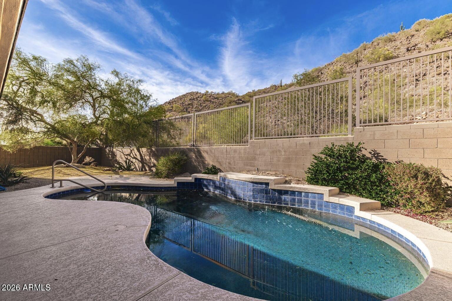 14146 East Coyote Road Scottsdale, AZ 85259 - Photo 28 of 40 a view of a backyard with sitting area