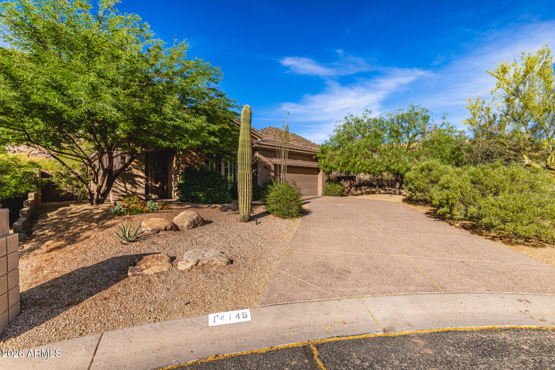14146 East Coyote Road Scottsdale, AZ 85259 - Photo 29 of 40 a view of a house with a yard