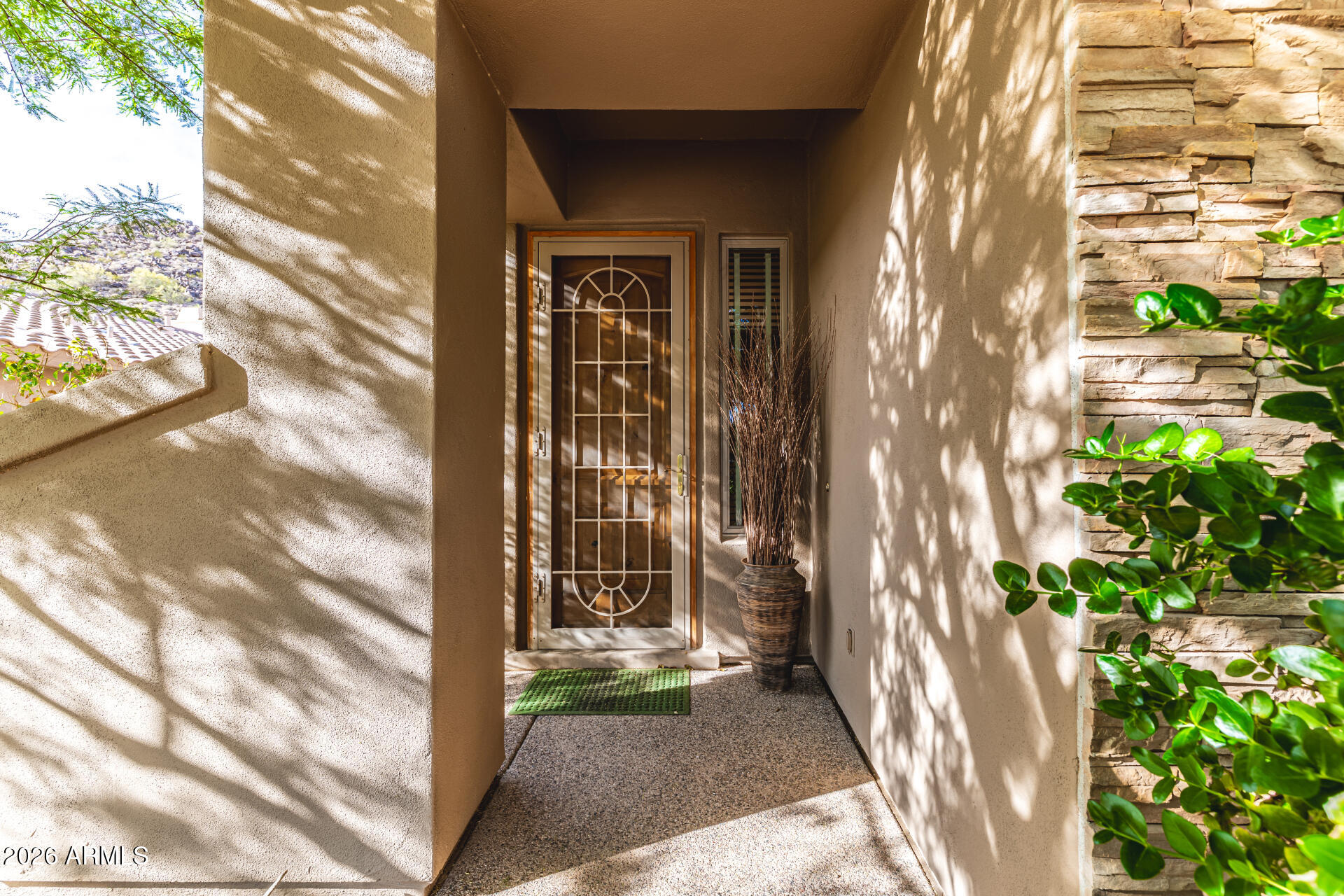 14146 East Coyote Road Scottsdale, AZ 85259 - Photo 3 of 40 a view of a back yard from a corridor