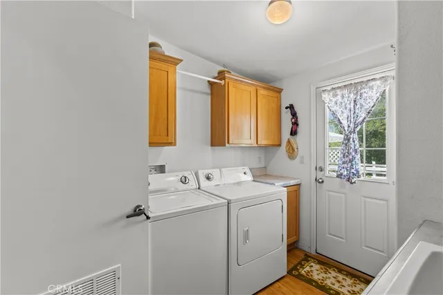 a bathroom with a sink vanity and a mirror