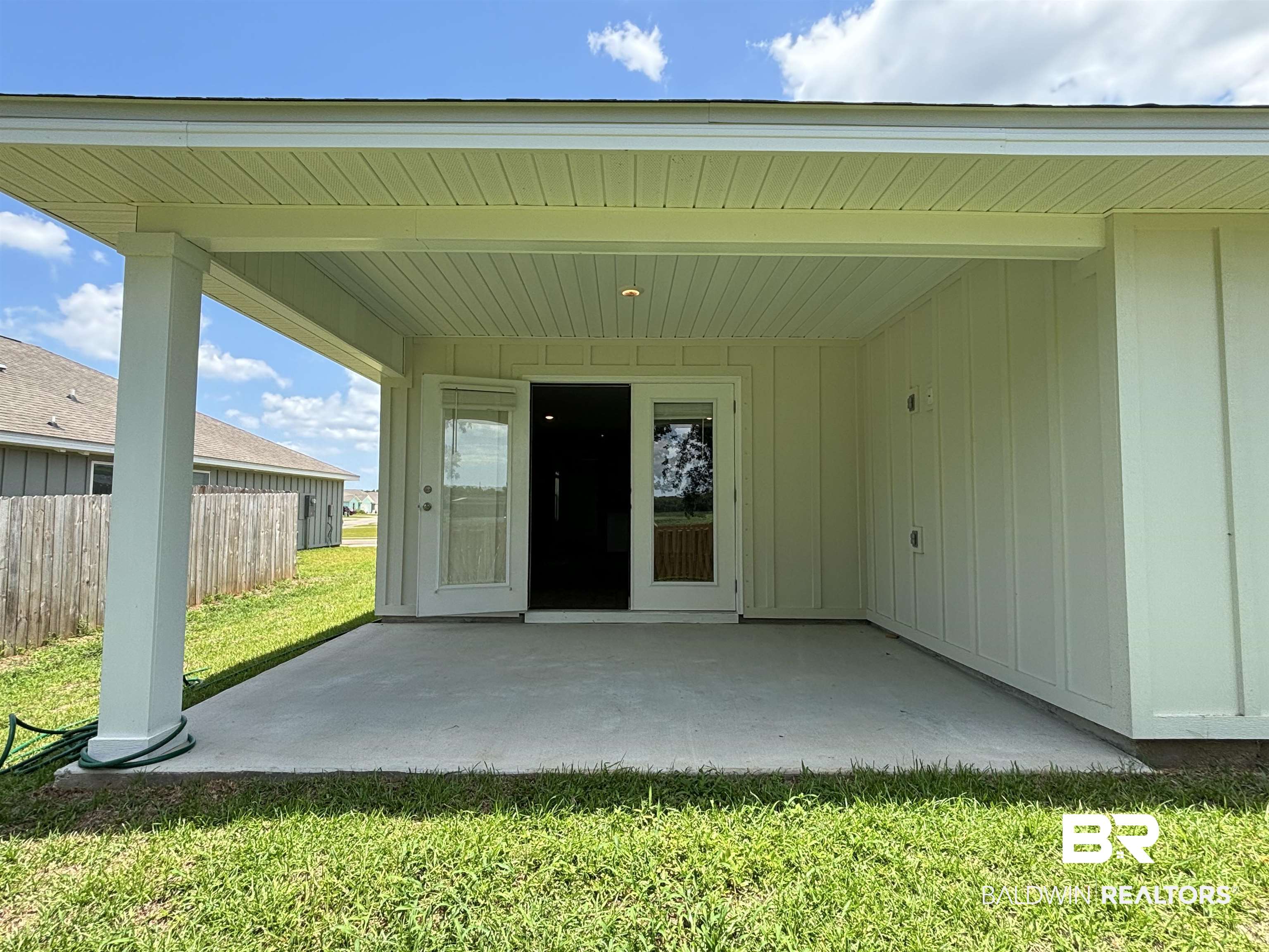 24504 Ponder Loop Loxley, AL 36551 - Photo 10 of 50 Back Patio Double Doors